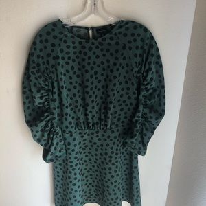 Green and black polka dot dress